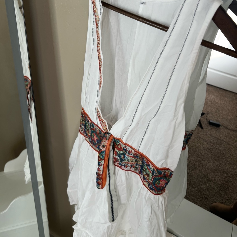 White Sleeveless Top with Embroidered Trim
